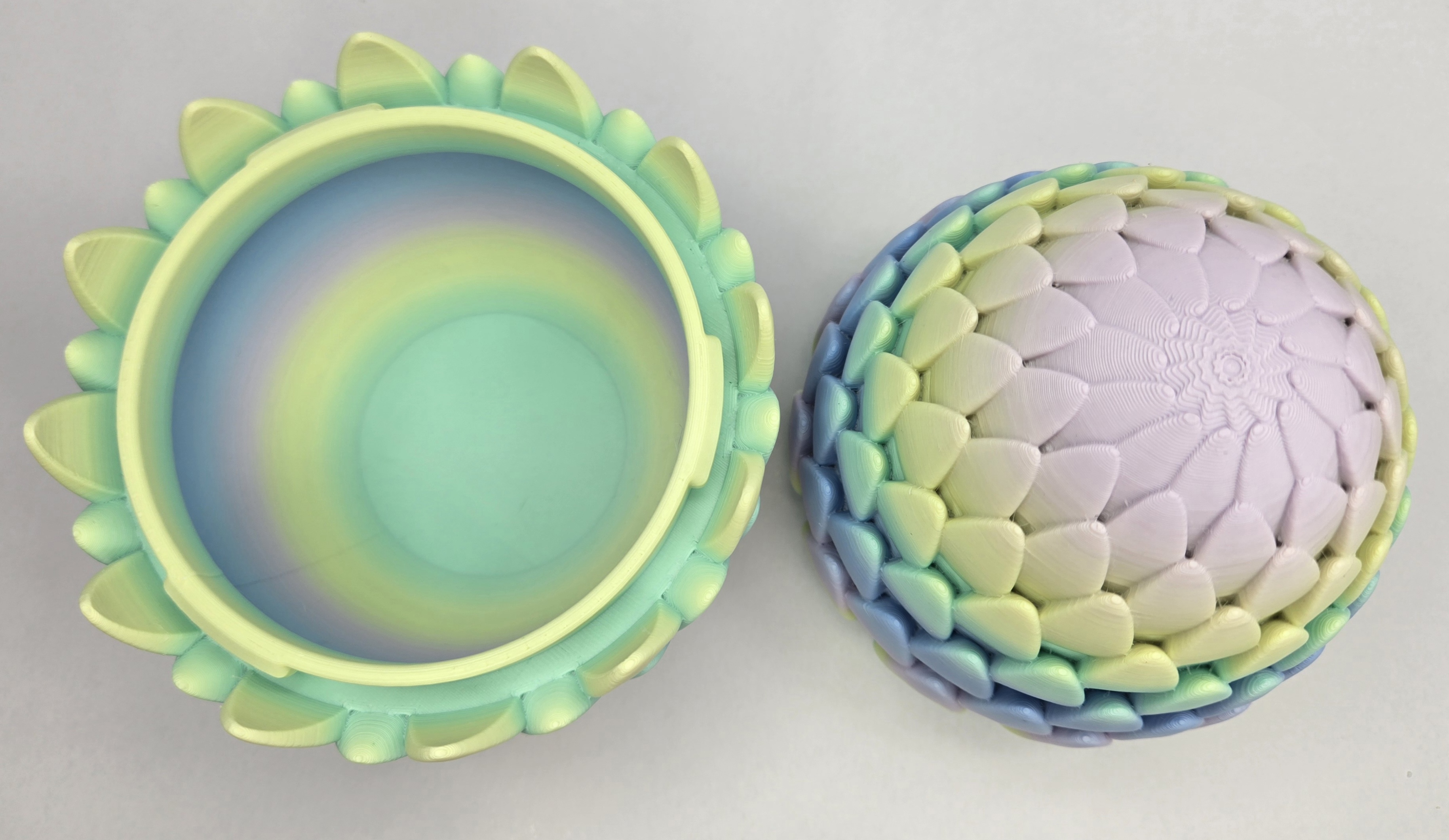 Rainbow dragon egg opened showing colourful interior