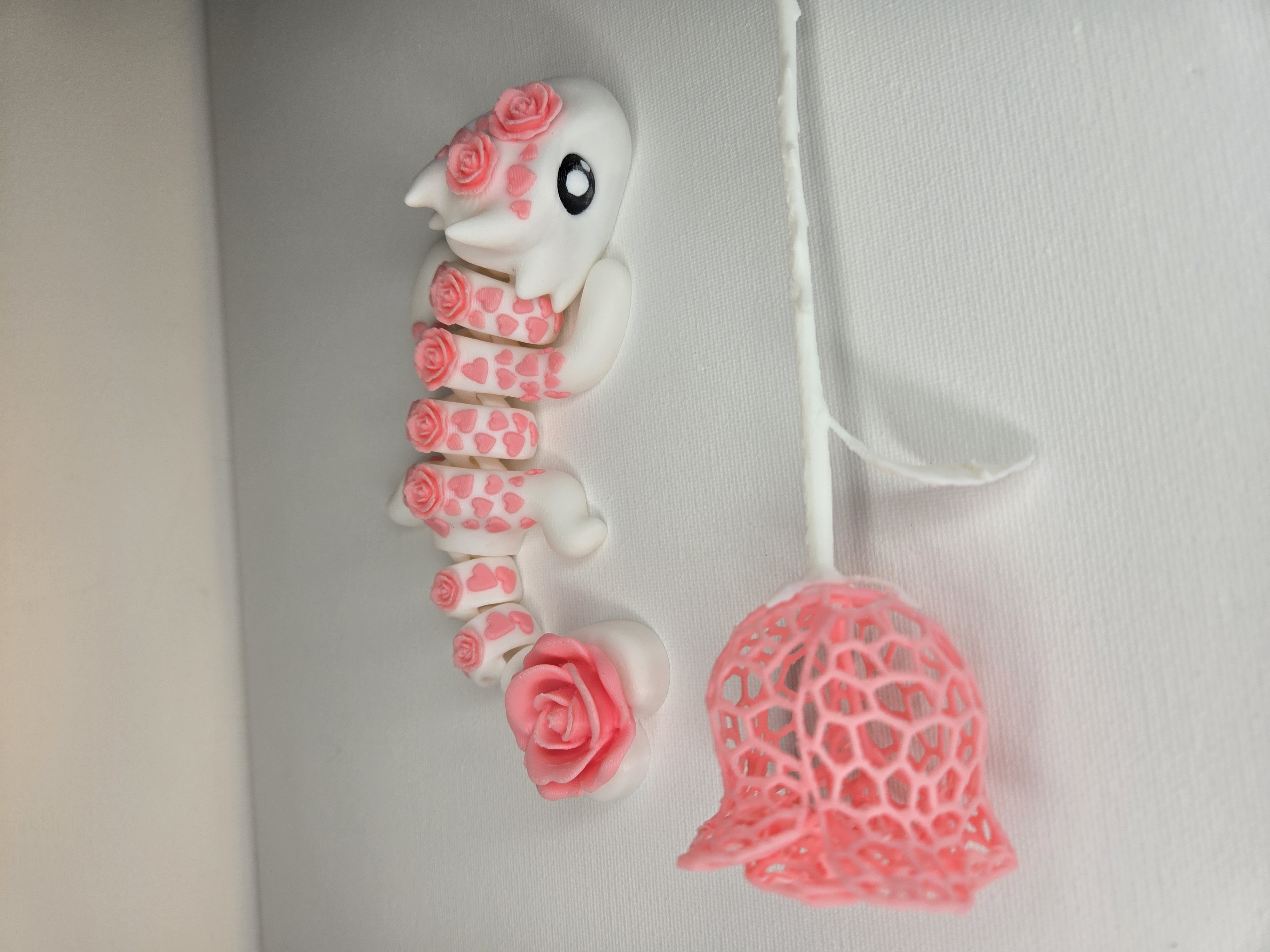 Love bloom dragon beside a matching rose